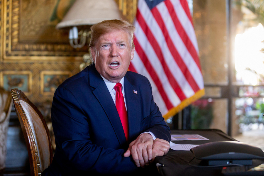 President Donald Trump speaks to the press after video calling members of the Armed Forces on Christmas Eve. Photo By Richard Graulich