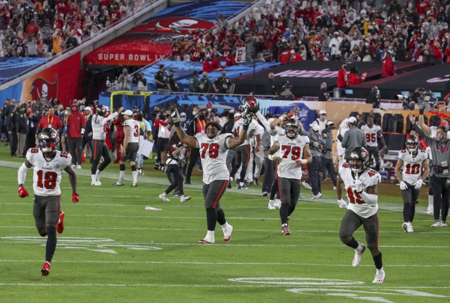 Tampa Bay Buccaneers players celebrate their 31-9 win over the Kansas City Chiefs in Super Bowl 55 Sunday, Feb. 7, 2021 in Tampa.