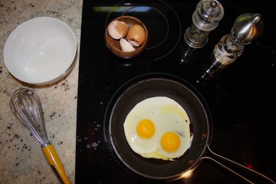 Set the table. Surrounded by readily available tools and ingredients, eggs mingle with oil, cooking on the pan. Imperative to any food preparation is the setup of ingredients and equipment prior to cooking, otherwise known as mise en place. Photo by Dana Masri.