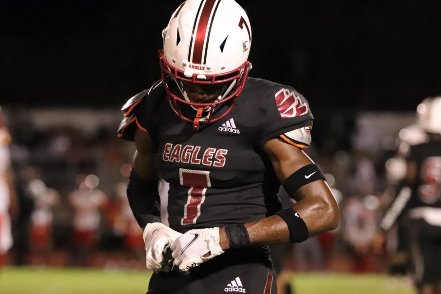 Varsity football cornerback Luke Evans (7), prepares for Marjory Stoneman Douglas’ Homecoming game against Deerfield Beach High. Evans transferred to MSD from Saint John Paul II Academy and has already received a Division 1 football offer from Iowa State University. 