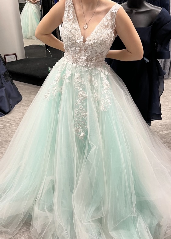 Senior Reese Garrity picks a flowy dress with dazzling flowers for prom, but in lavender.